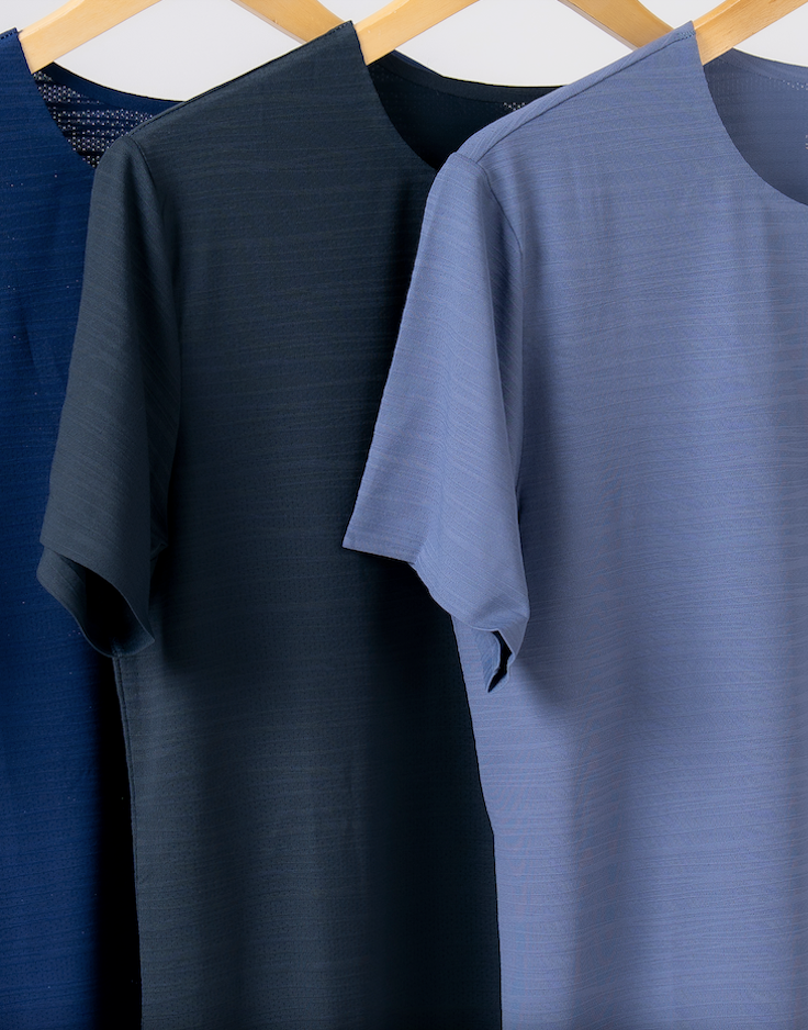 Three short-sleeve lightweight t-shirts in the colors navy, charcoal and cool blue grey. Designed for the adaptable man. Lightweight, durable and ready for whatever the day demands.