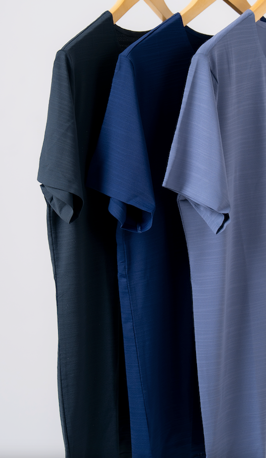 Three short-sleeve lightweight t-shirts in the colors navy, charcoal and cool blue grey. Designed for the adaptable man. Lightweight, durable and ready for whatever the day demands.