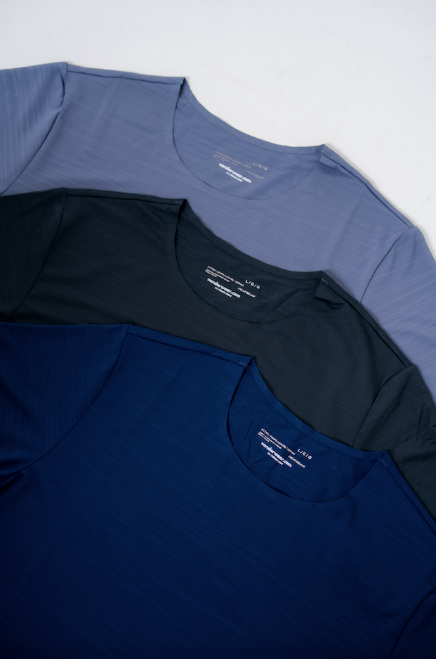 Three mens tshirts in the color navy charcoal and cool blue grey made out of breathable fabrics that support every day life.