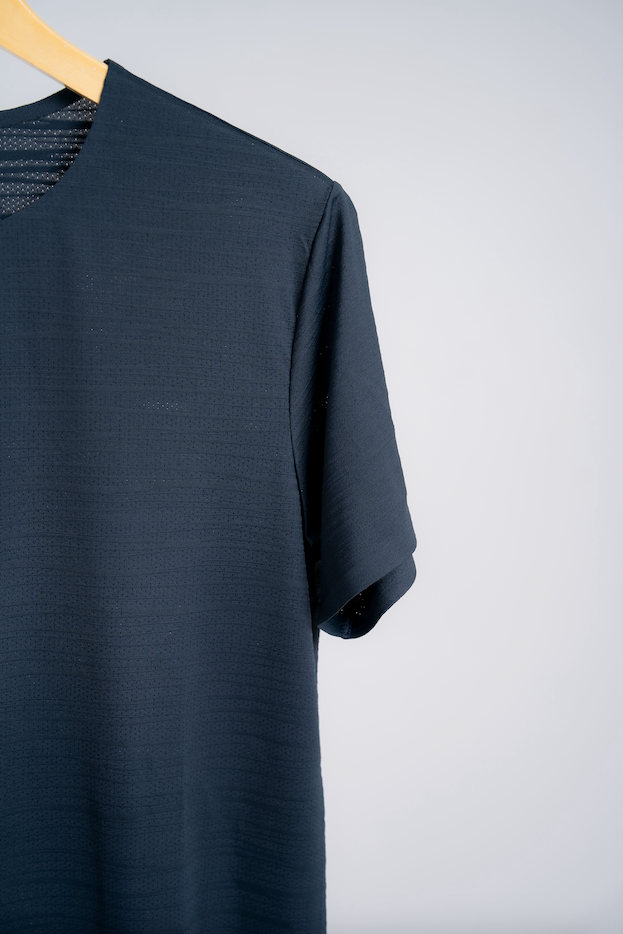 A charcoal colored Omaha versatile t-shirt built for work, travel, training and everyday life. Designed for men who adjust to every challenge.