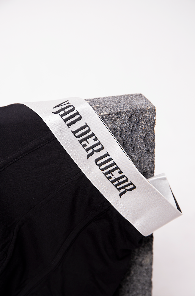 Super stretchy polyester waistband made from high performance fabric in black. 